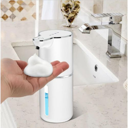 distributeur de savon automatique blanc sur lavabo