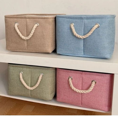 paniers de rangement vue pres quatre couleurs sur etagere