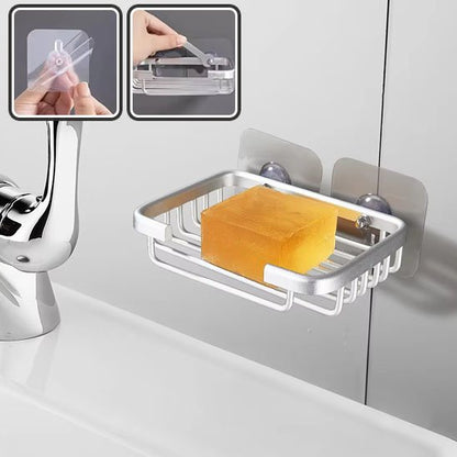 porte savon douche argent savon orange dedans droite statue plus deux images