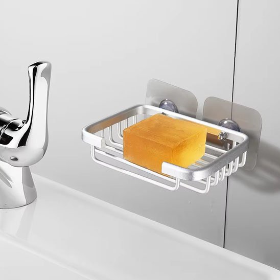 porte savon douche argent savon orange dedans droite statuette