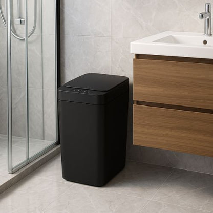 poubelle de salle bain noire entre douche meuble